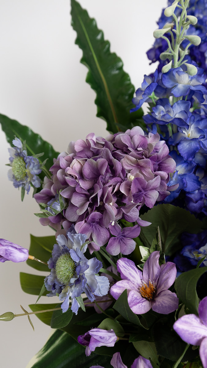 Faux flower arrangement by Flowers by EG